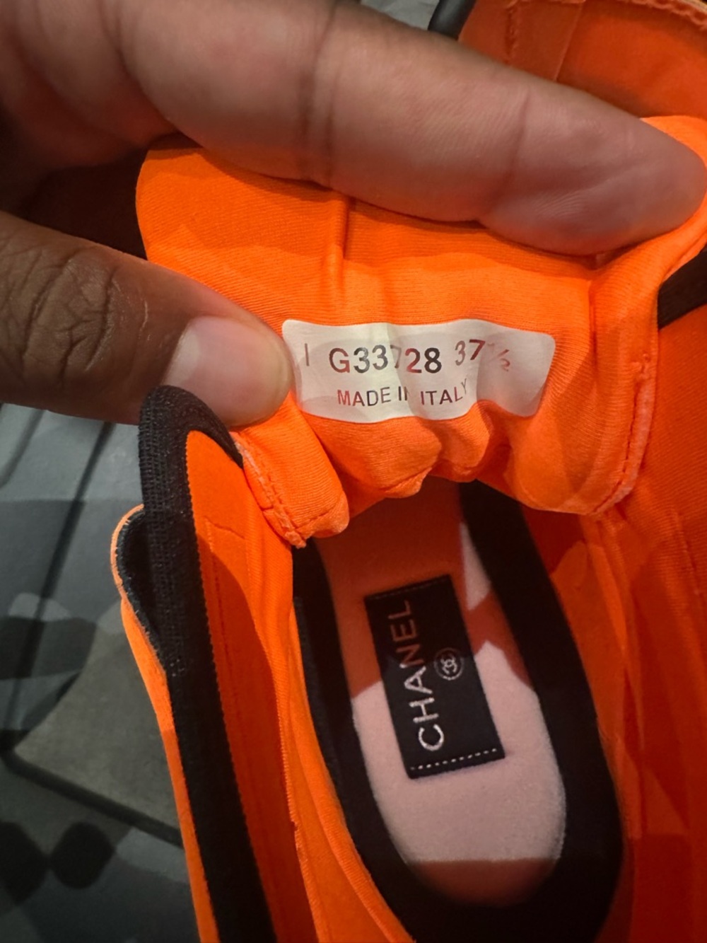 CHANEL Neon Orange and White CC Logo High-Top Sneakers - Picture 9 of 10